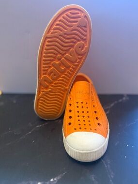 Native Kids Slip-On Sneakers in Orange with White Toe